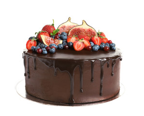 Fresh delicious homemade chocolate cake with berries on white background