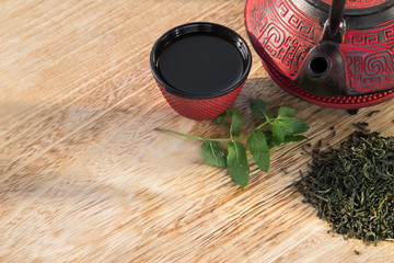 Asian tea set on wooden table