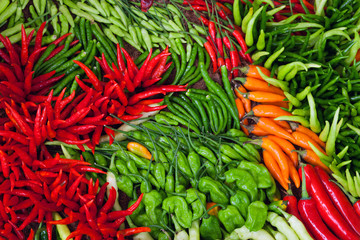 Heap Of Ripe Big Red Peppers At A Street Market In thailand