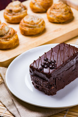 Chocolate cake on white plate