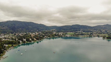 Fototapeta na wymiar Aerial view of Portschach Am Worthersee small town on beautiful lake Worthersee in Austria