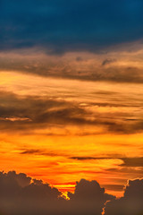 Twilight sky background. Colorful Sunset sky and cloud.vivid sky in twilight time background.Fiery orange sunset sky. Beautiful