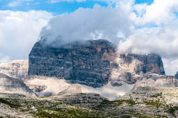 Fototapeta na wymiar Rugged Mountain Ranges in Tre Cima Natural Park Area in the Italian Dolomites.