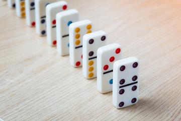 Dominos on wooden background