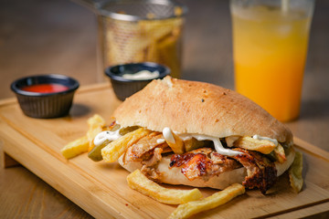 Delicious doner kebab on wooden background