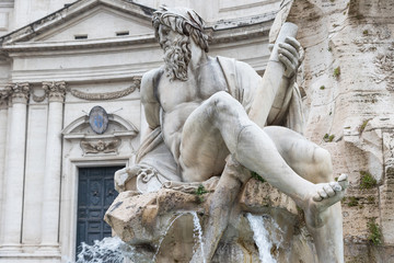 Zeus Statue in Fountain of the Four Rivers in the Piazza Navona (Navona Square) in Rome was designed in 1651 by Gian Lorenzo Bernini. Italy.