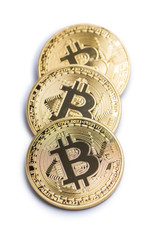Golden bitcoin isolated on white