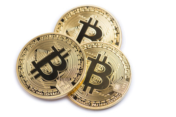 Golden bitcoin isolated on white