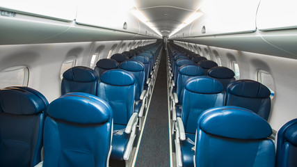 Fototapeta premium Empty seats in economy class airplane