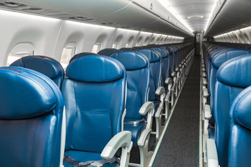 Fototapeta premium Empty seats in economy class airplane