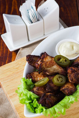 Fried chicken legs with jalopeno and mayonnaise