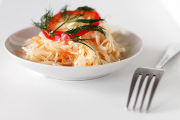 rustic salad with sauerkraut and pepper and onions