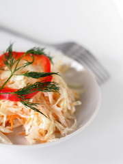 rustic salad with sauerkraut and pepper and onions