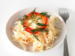rustic salad with sauerkraut and pepper and onions