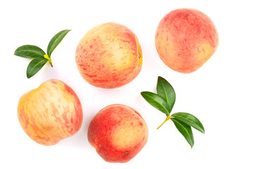 ripe peaches with leaves isolated on white background. Top view. Flat lay pattern