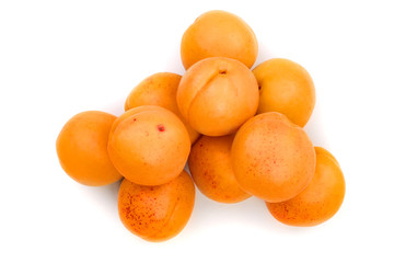 heap apricot fruits isolated on white background. Top view. Flat lay pattern