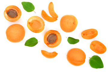 Apricot fruits with leaves isolated on white background with copy space for your text. Top view. Flat lay pattern