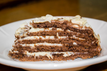 A cake biscuit honey cake slice on a plate one for a background
