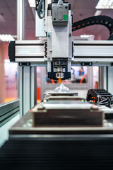 CNC Laser cutting of metal, modern industrial technology.