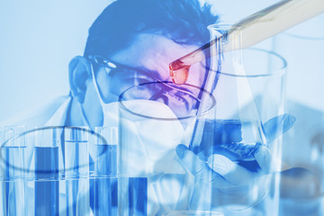 Double exposure scientist in laboratory to research with test tube , science concept.