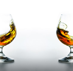 Cognac glasses with splashes inside