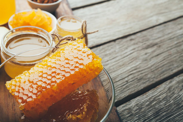 Different varieties of sweet golden fresh honey