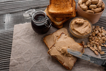 peanut paste on a wooden rustic background