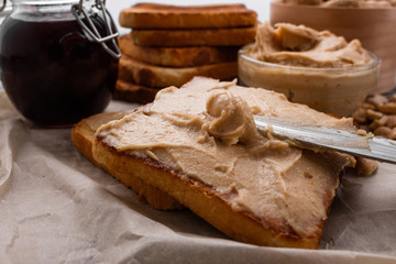 peanut paste on a wooden rustic background