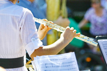 Flute music playing flutist musician performer with musical instrument