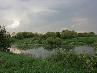 landscape with river and clouds