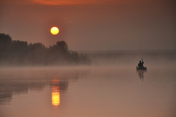 Beautiful sunrise on river in Russia in Moscow region 