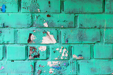 Graffiti painted on a brick wall texture.