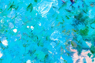 Multicolored smears with oil paint on the wall.