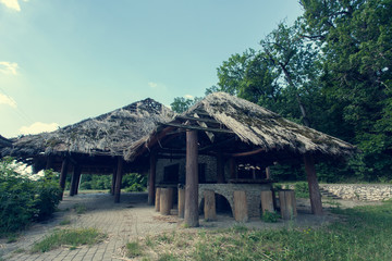 Fototapeta na wymiar old houses covered with reed
