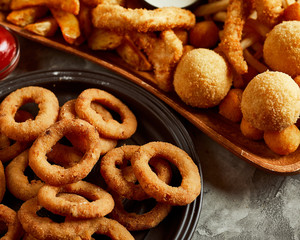 Variety of beer snack and one glass of beer