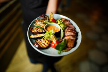 Smoked duck breast with grilled vegetables and sweet pineapple sauce