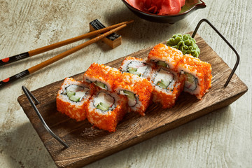 Sushi served with wasabi, ginger and soy sauce