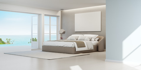 Sea view bedroom of luxury summer beach house with double bed near wooden floor terrace and swimming pool. Empty white frame on wall in vacation home or holiday villa. Hotel interior 3d illustration.