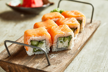 Sushi served with wasabi, ginger and soy sauce