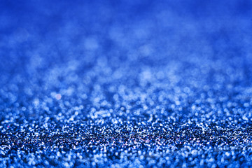 Shiny blue abstract christmas background. Blue glitter.