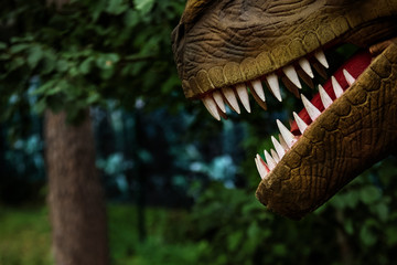 Jaws of a dinosaur in forest