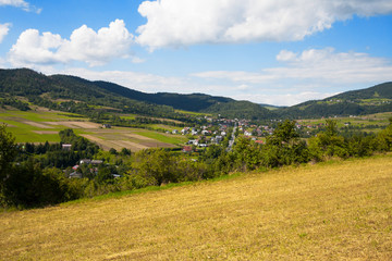 After harvest. View of polish village in the mountains.