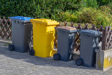 Different dustbins on the street