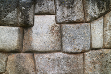 The huge wall of the citadel of Sacsayhuaman, unique stonework of the ancient Inca Cusco, Peru  