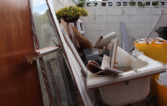 Bathroom renovation project items left for refuse collection , repair and replace old items. 