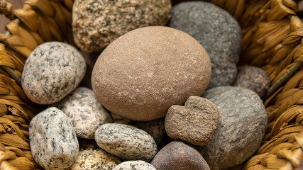 Stones on a basket.