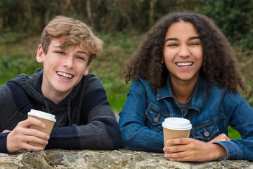 Mixed Race Teenagers Boy & African American Girl Drinking Coffee