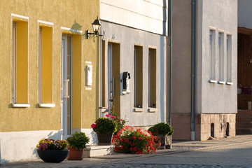 Fototapeta na wymiar typical german house with flowers in front of the door