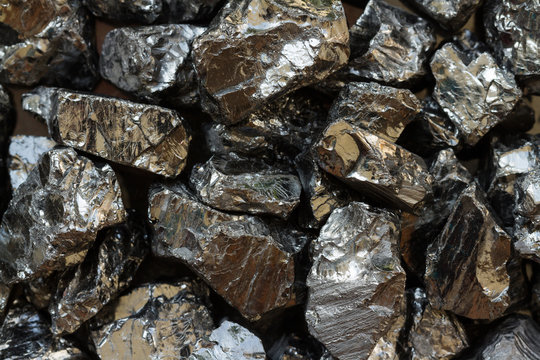 Natural black coal bars for background. Industrial coal nuggets close up