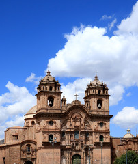 Fototapeta na wymiar The Iglesia de la Compania de Jesus Church against Sunny Vivid Blue Sky of Cusco, Peru, South America